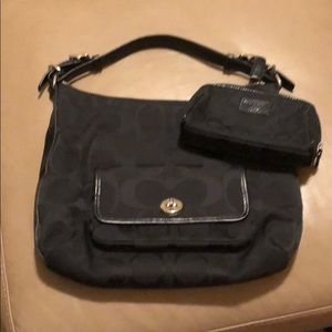 Coach purse with makeup bag